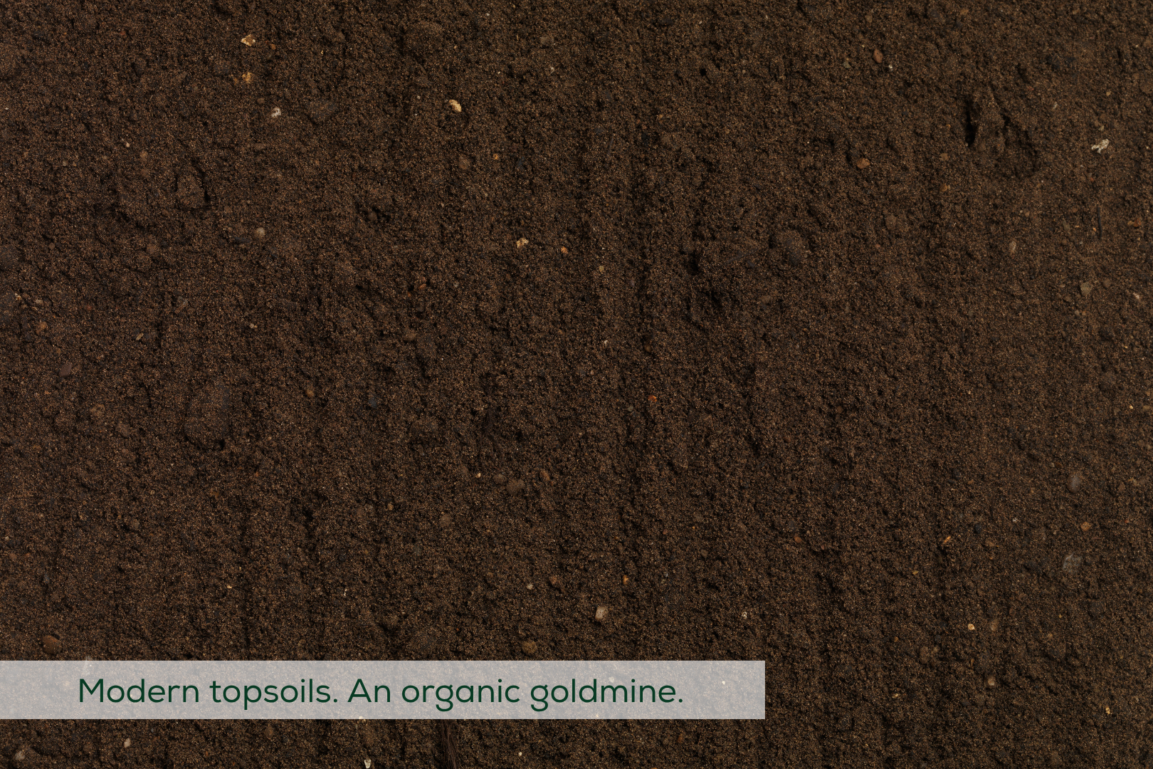 Top-down image of topsoil, with caption 'Modern topsoils. An organic goldmine.'